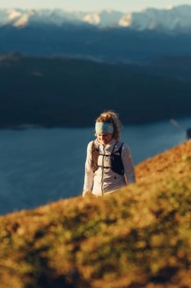 Trail running in autumn on the Jochberg on Lake Walchensee against the wonderful backdrop of the