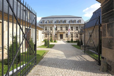 Courtyard entrance with metal gate to the cathedral dechanei, courtyard, Halberstadt, Harz,