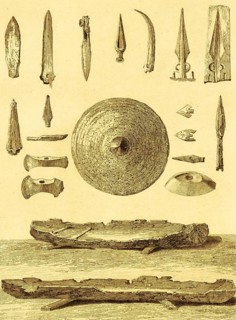 Roman era weapons and canoes, wooden boats, spearheads, axe, knife, shield, metal, archaeology,