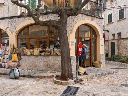 Small alleys with cafes, restaurants and fashion stores in the picturesque mountain village of