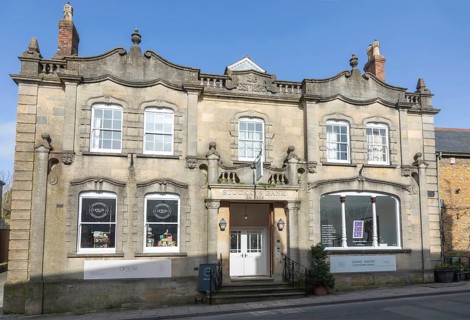 Historic former Stuckeys Bank building, High Street, town centre of Castle Cary, Somerset, England,