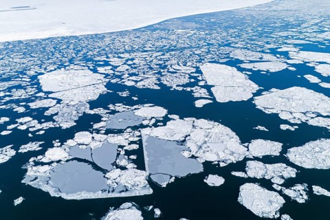 Ice broken after a ship passed over the frozen St. Lawrence River, Region of Center Quebec,