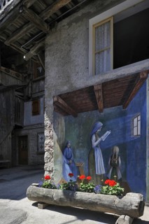 Murals on houses at Cibiana di Cadore, Dolomites, Italy