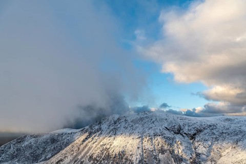 Lighting over snowy fells, Söröya, Finnmark, Norway, October 2018