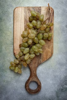 A branch of white grapes, wine grapes, Georgian grape variety Rkatsiteli, top view