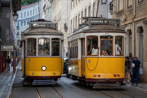 LISBON, PORTUGAL - MAY 19, 2025: Famous tram number 28 at the street of Lisbon