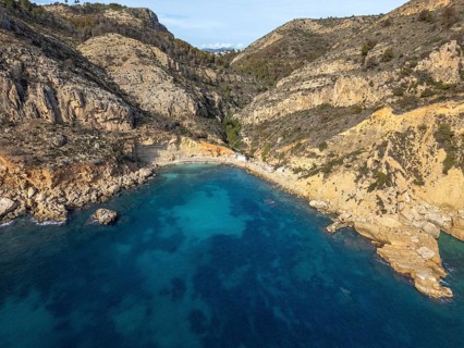 A breathtaking view of the Costa Blanca coastline, where the crystal-clear Mediterranean Sea gently