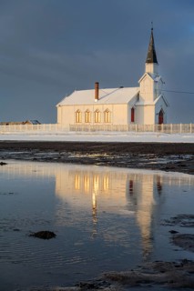 Church in the morning light, cloudy mood, beach, sea, winter, Nesseby Church, Varanger Peninsula,