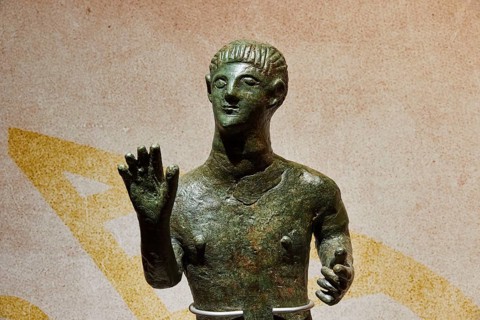 Diocouroi or athlete, bronze male statue with raised hand, ornate and antique, Pylos Archaeological