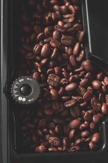 Coffee machine, coffee bean container, top view, close-up, no people, rustic style, selective focus