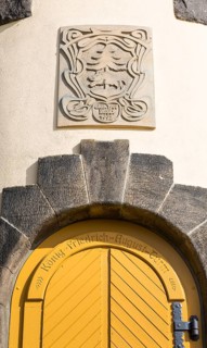 Coat of arms above the door and inscription on the door of the König-Friedrich-August-Turm,