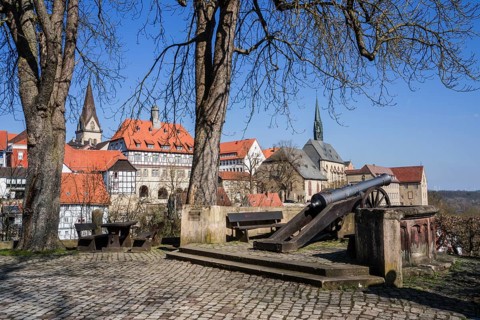 The Fügeler cannon on the castle rondel with panoramic view over medieval town of Warburg
