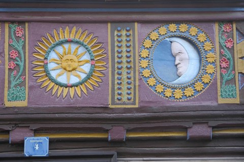 Floral figures of bright sun and moon, moon face with circle stars, wood carvings, handicrafts,