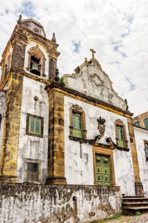 Aged historic church facade in the city of Olinda in the state of Pernambuco, northeastern Brazil,