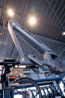 Modern grey bicycle frame in a well-lit workshop, Waldbike Manufaktur, bicycle workshop, Calw,