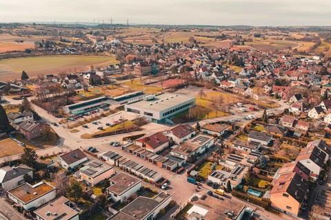 A bird's eye view of a rural town with scattered houses and fields in the area, Ötisheim, Enzkreis,