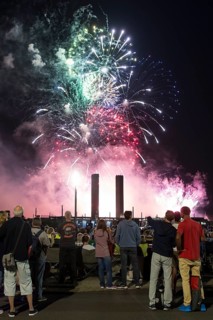 Spectators watch the fireworks at the Pyronale on the Maifeld at the Olympic Stadium, Berlin,