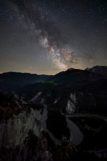 Starlit sky with Milky Way over Rhine Valley, Canton of Grisons, Switzerland
