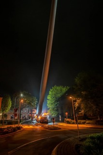 Transport of a 68 metre long, 22 tonne blade of a wind turbine, here in Breckerfeld, with a