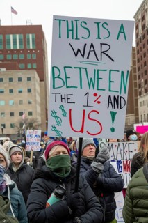 Lansing, Michigan USA - 5 February 2025 - People rally at the Michigan state capitol to oppose