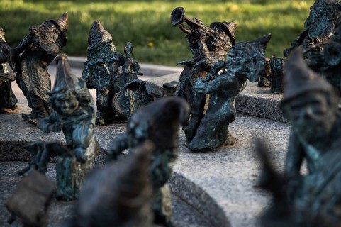 WROCLAW, POLAND - APRIL 22, 2023: Statue of dwarves representing philarmonic orchestra of Poland