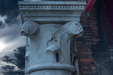 Chapter design on the pillars of the fish market, Rialto market in the San Polo district, Venice,