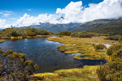 Mountain landscape with lake on the Key Summit Track hiking trail. Fiordland National Park,