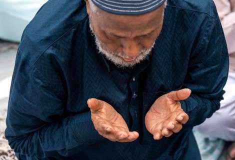A Muslim person attend to Eid al-Fitr prayer at Eidgah, on March 21, 2026 in Guwahati, India.