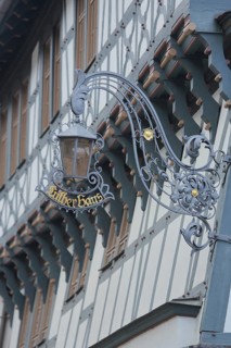 Nose sign with lantern from Luther House, home of Martin Luther, inscription, half-timbered house,