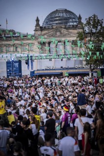 Scenes in the fan zone on Platz der Republik in front of the Reichstag building taken in Berlin, 29