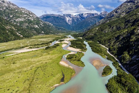 Gravel road along river Rio Norte, Valle Exploradores, aerial view, near Puerto Tranquilo,