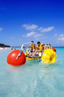 Central America, Caribbean, children with water buggy, Bahamas
