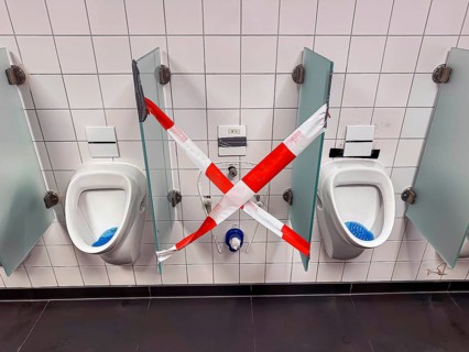 Broken urinal in an inn. Rottweil, Baden-Württemberg, Germany