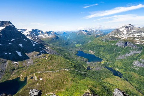 View from the summit of Innerdalstårnet of mountainous landscape, Innerdalen high valley and lake