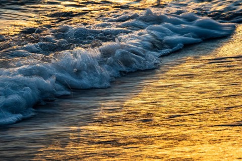 Wave play at sunrise on the chalk coast in Jasmund National Park, Rügen, Sassnitz,