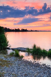 View from Arbon over Lake Constance at a colourful sunset in the canton of Thrugau, Switzerland