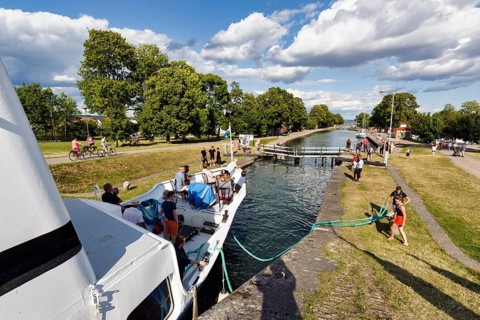Passenger ship Wasa Lejon with tourists on Göta Canal, lock steps near Berg, Linköping,