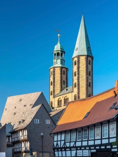 The towers of the market church above the half-timbered houses in the historic old town, Goslar,