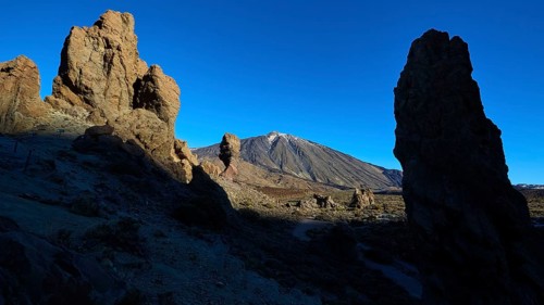 Roques de Garcia, dark silhouettes of rocks in volcanic landscape at sunset, Teide, Parque Nacional