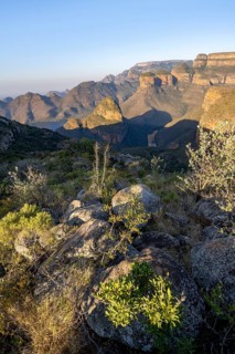 Sunset at Blyde River Canyon with Three Rondawels peak, view of canyon with Blyde River and Mesa