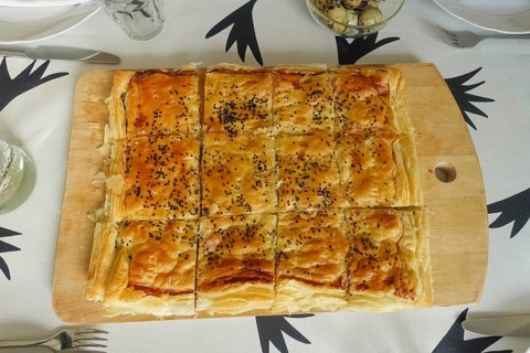 Vegetarian cuisine, puff pastry spinach cake, filled puff pastry, from the oven, baked, wooden