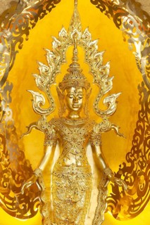 Symbolic depiction of Buddha as an enlightened, radiant and royal being, with a flame-shaped