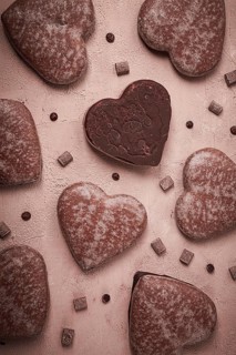 Food wallpaper, chocolate glazed gingerbread, heart-shaped, top view, no people