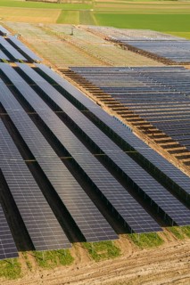 Extensive solar fields with uniform, parallel rows of panels in a natural environment, Agri PV Bau