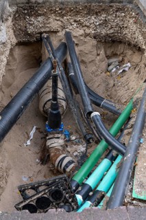 Construction site, excavation pit, work on supply lines, various types, electricity, water, gas,