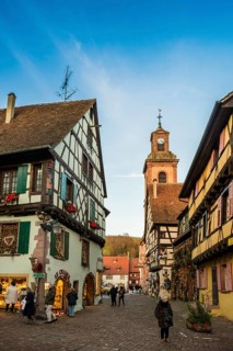 Christmassy decorated half-timbered houses, Christmas market, Riquewihr, Grand Est, Haut-Rhin,