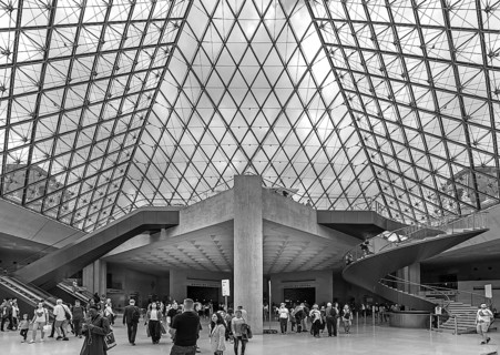 Entrance hall to the Louvre under the pyramid, black and white, Paris, Fankreich