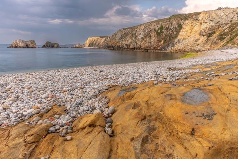 Pebble Beach on the Atlantic coast. Camaret, Crozon, Finistere, Brittany, France