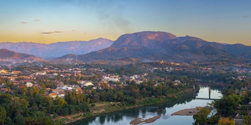 Panorama over Luang Prabang with Nam Khan River and Wat Phol Pao in the background, Laos Asia