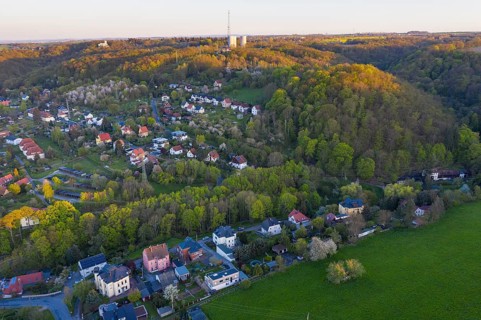 View of Niederwartha, on the hill the upper towers of the former pumped storage plant, Dresden,